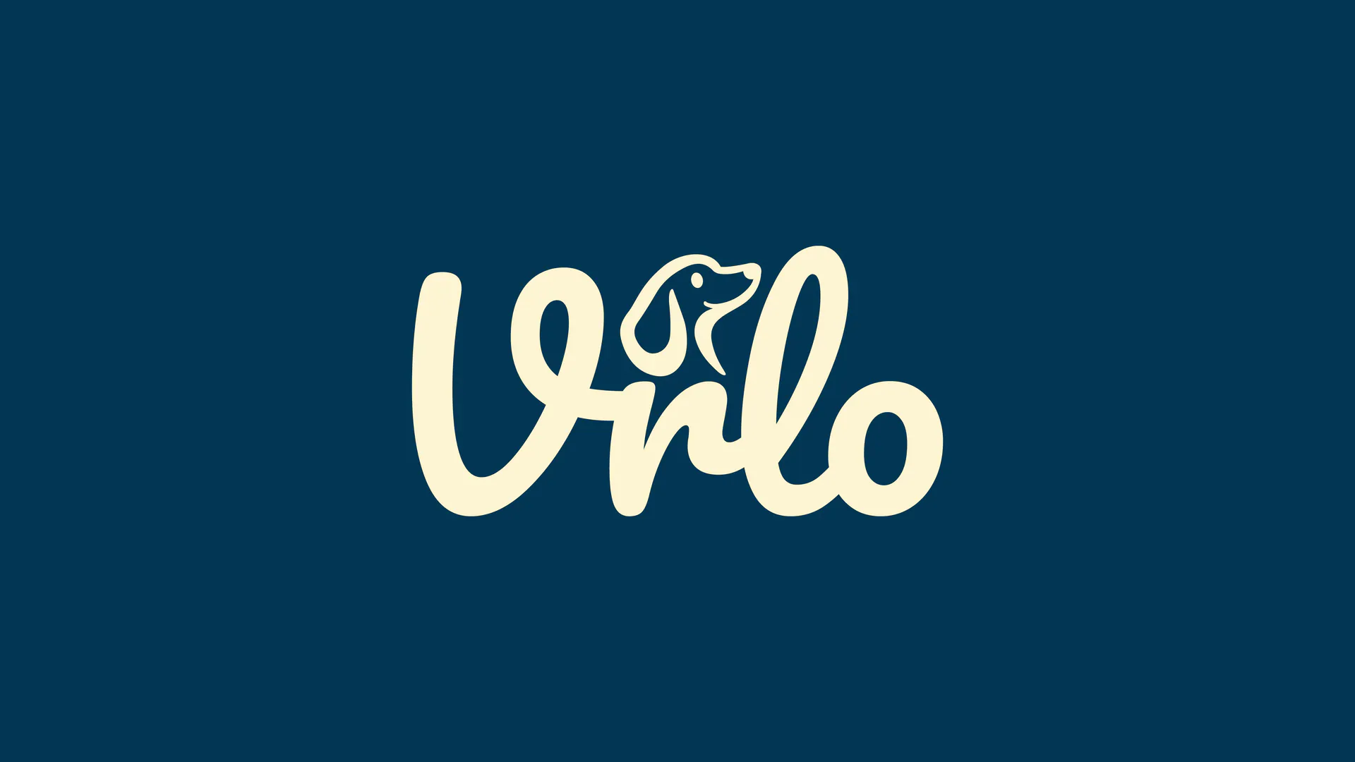 Vrlo handwritten wordmark with a dog integrated into the lettering